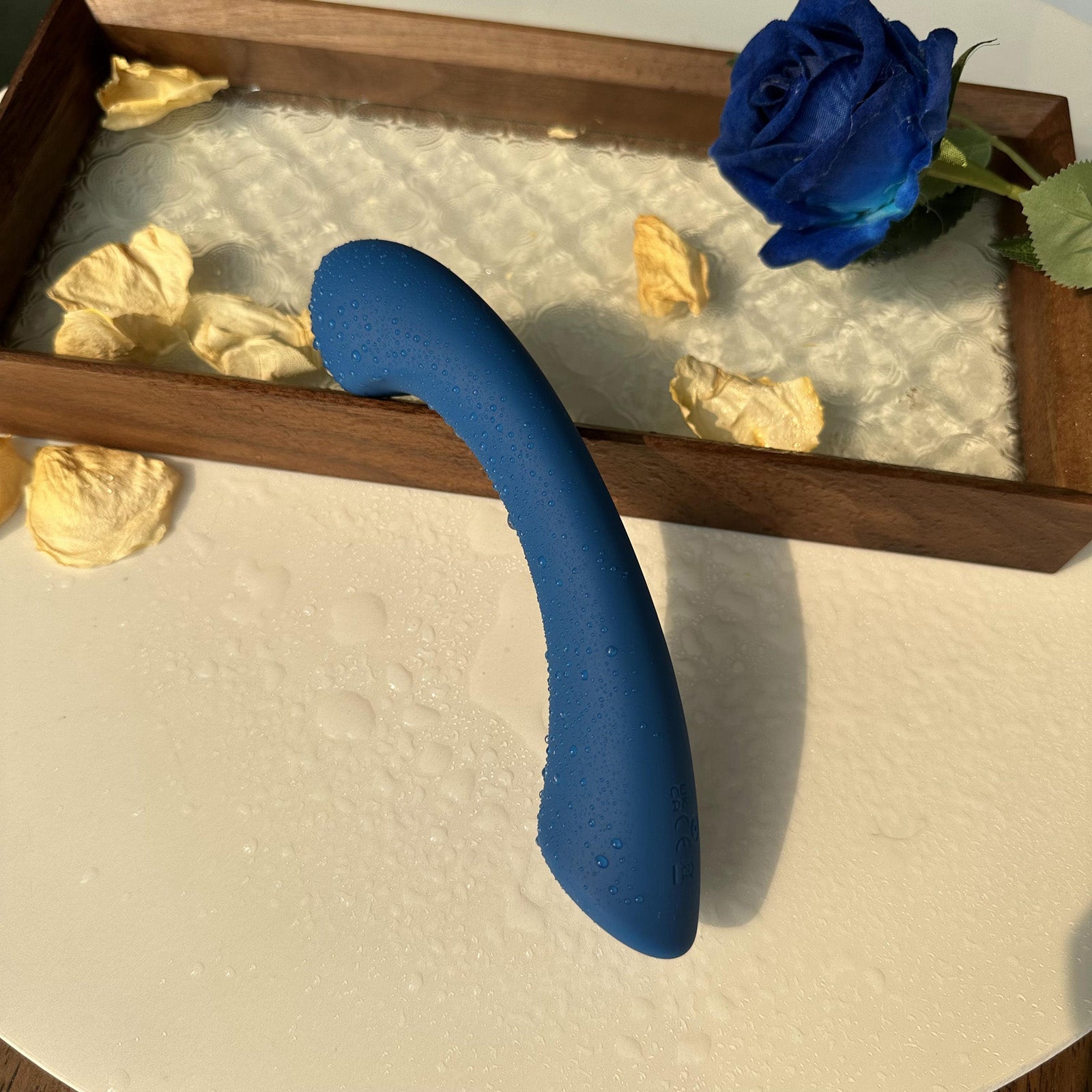 Crescent-shaped G-spot vibrator