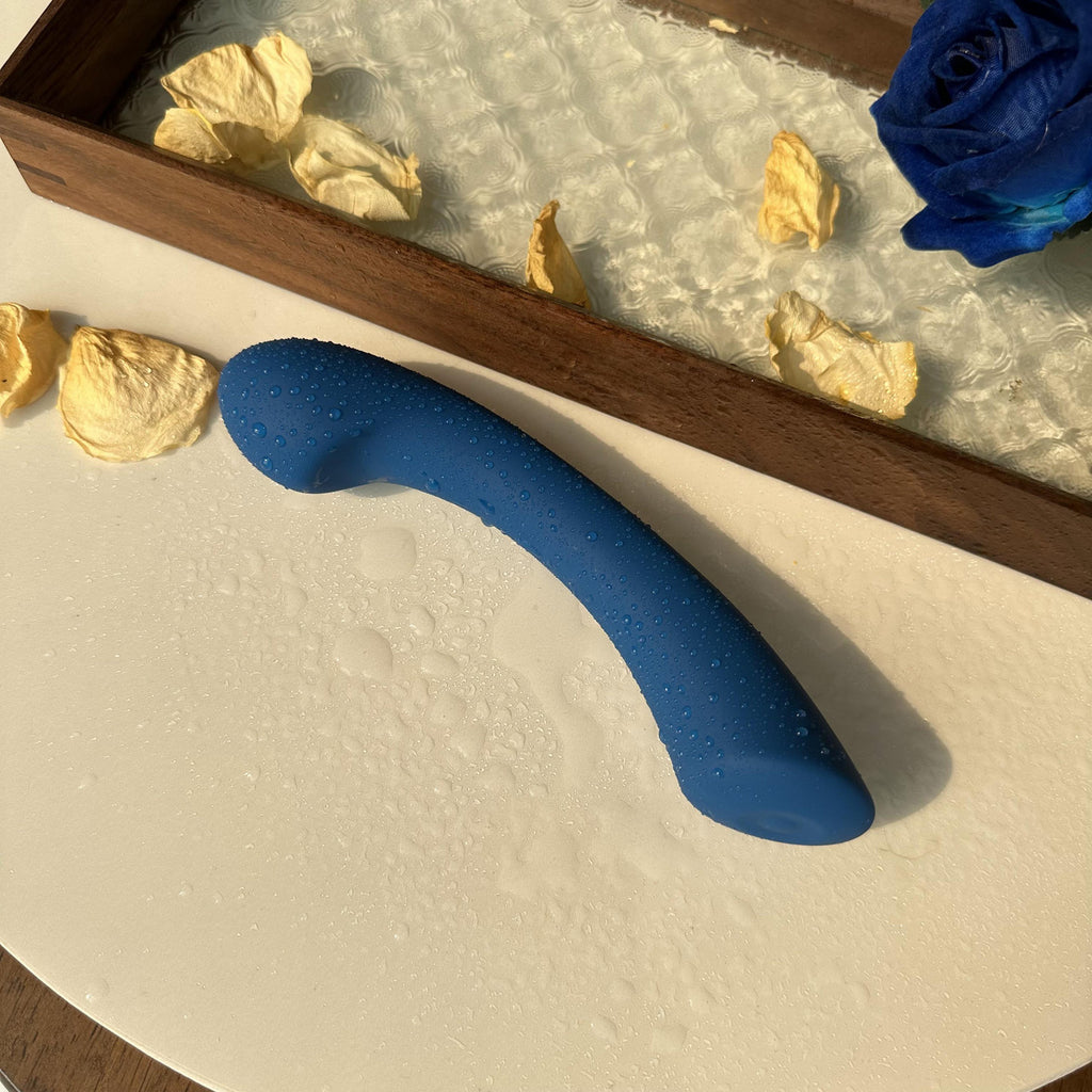 Crescent-shaped G-spot vibrator