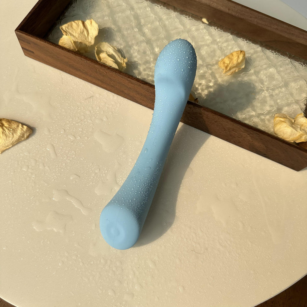 Crescent-shaped G-spot vibrator